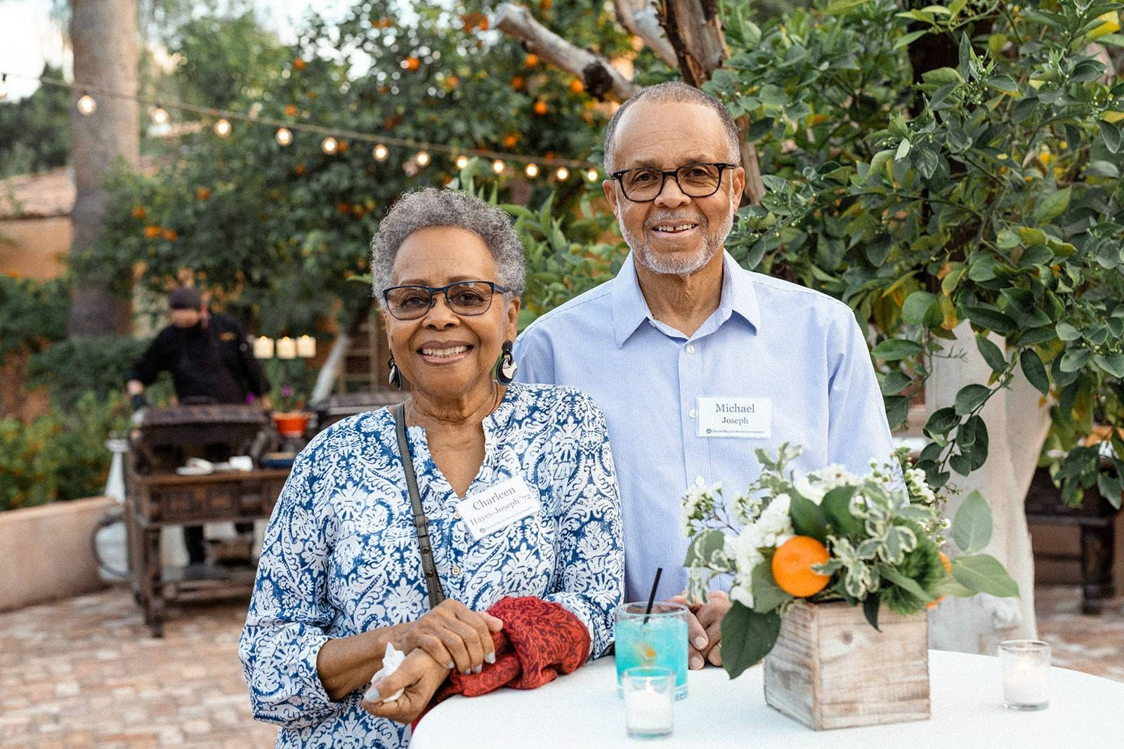 An older african american couple at a social event